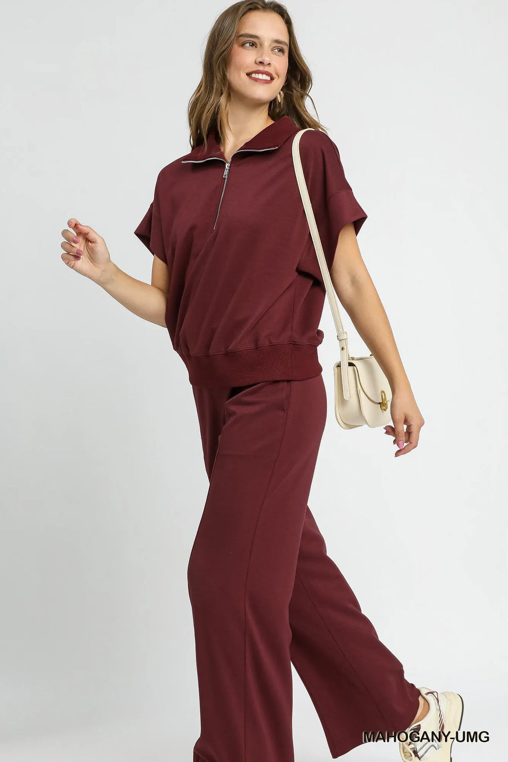 Umgee Women’s Full Size Half-Zip Short Sleeve Top Plus Size Rayon Polyester Plus Size S-2XL